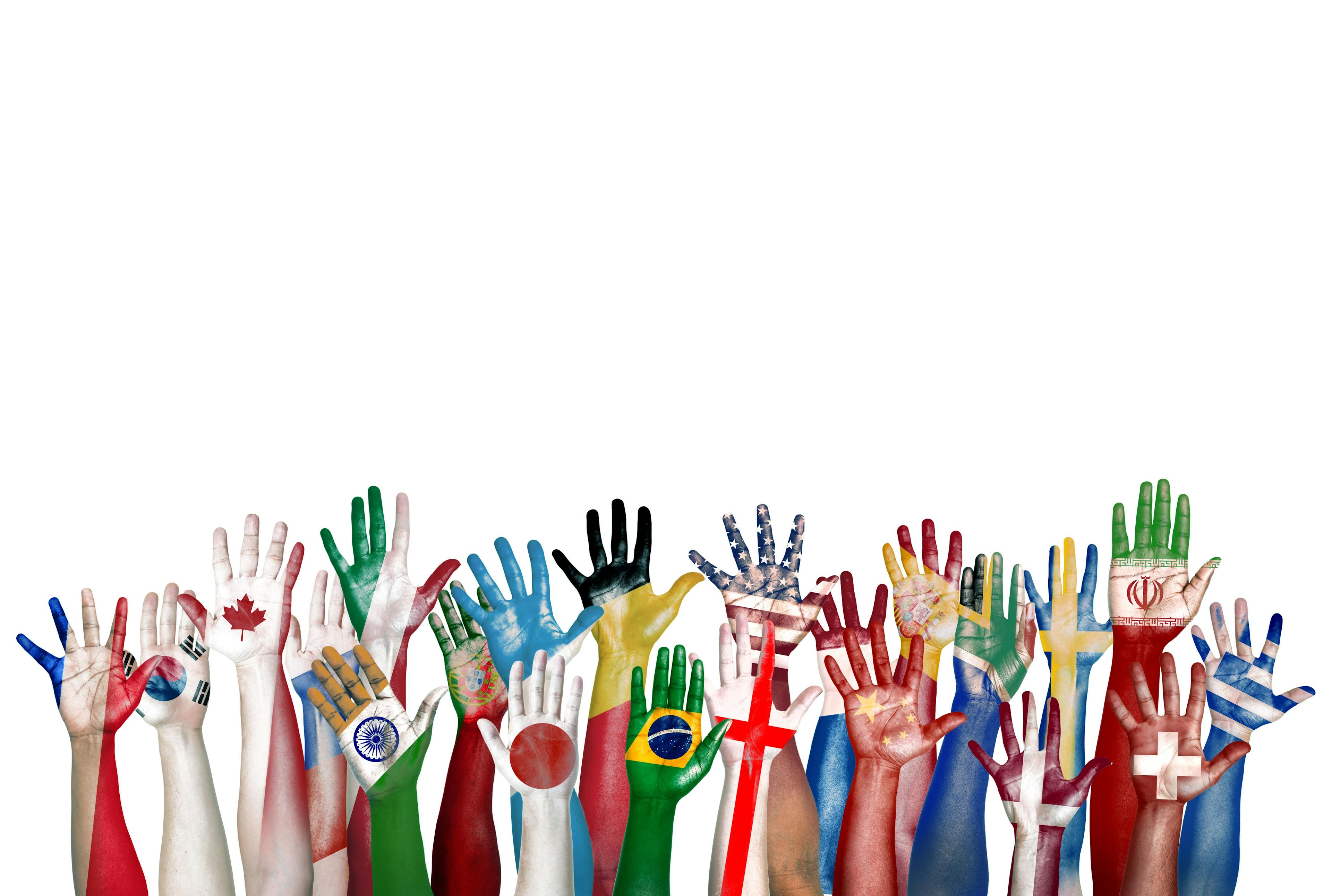 hands showing flags from many different countries
