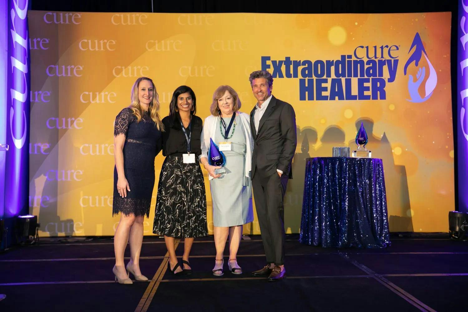 Margaret Campbell, BSN, RN, is joined by friend Nikita Patel, Kristie L. Kahl, vice president of content at MJH Life Sciences, and award-winning actor, producer and cancer advocate, Patrick Dempsey.

From left: Kristie Kahl, Nikita Patel, Margaret Campbell, BSN, RN, Patrick Dempsey.